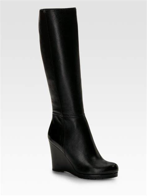 prada tall wedge boots black